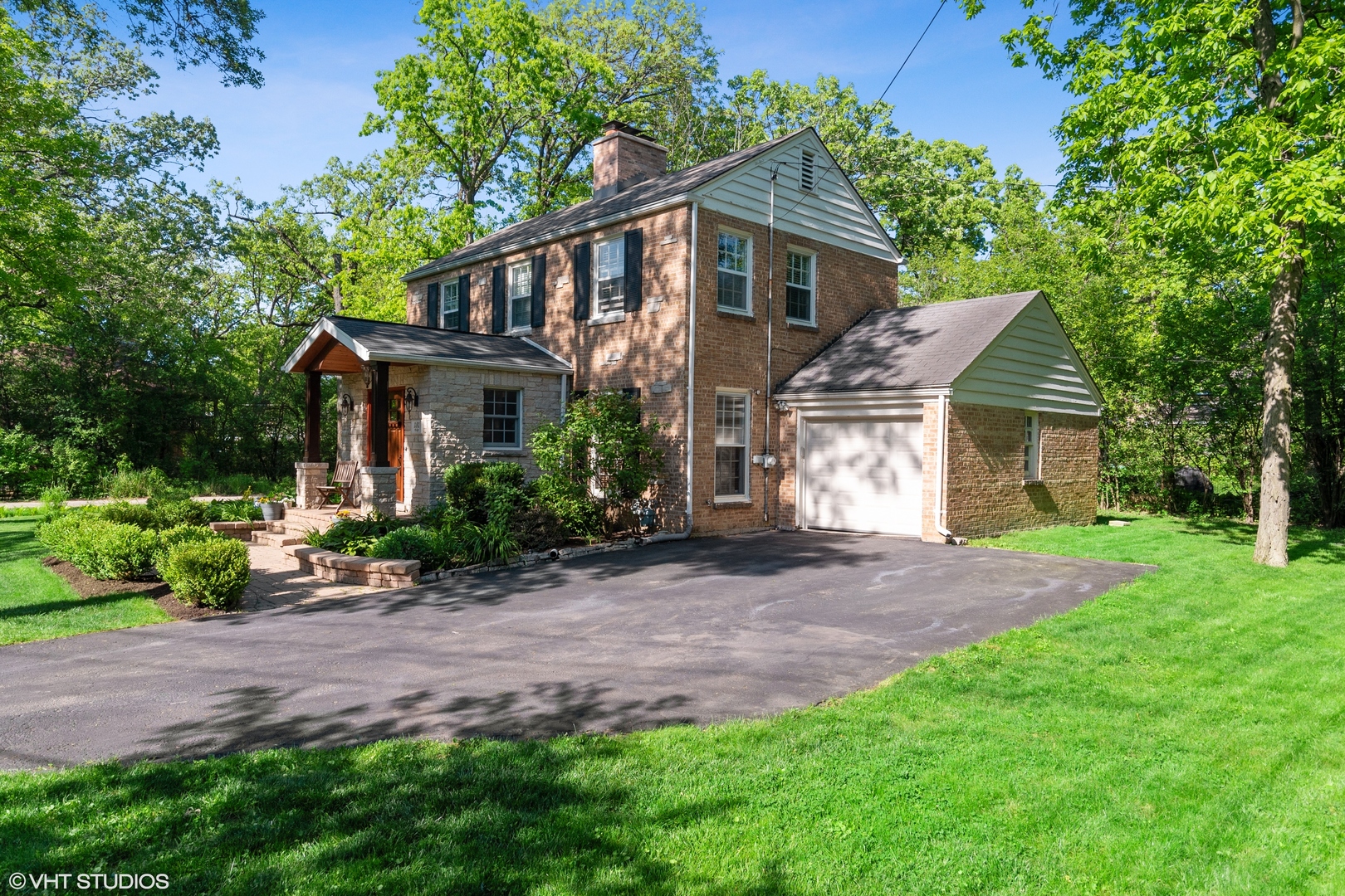 181 Ridge Road Highland Park, IL 60035 - Photo 16 of 16 a front view of a house with a garden and plants