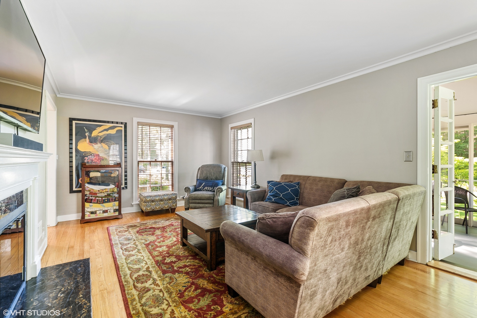 181 Ridge Road Highland Park, IL 60035 - Photo 8 of 16 a living room with furniture and a fireplace