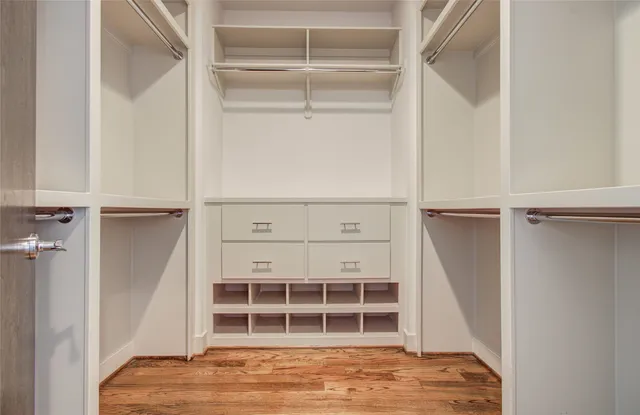 a white bath tub sitting in a bathroom