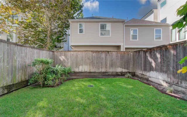 a view of a backyard with a garden