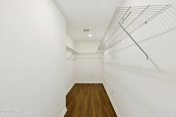 a view of a room with racks on the wall