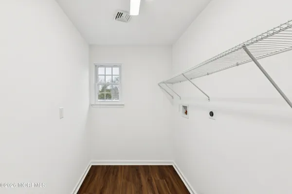 a view of small space with racks on the wall