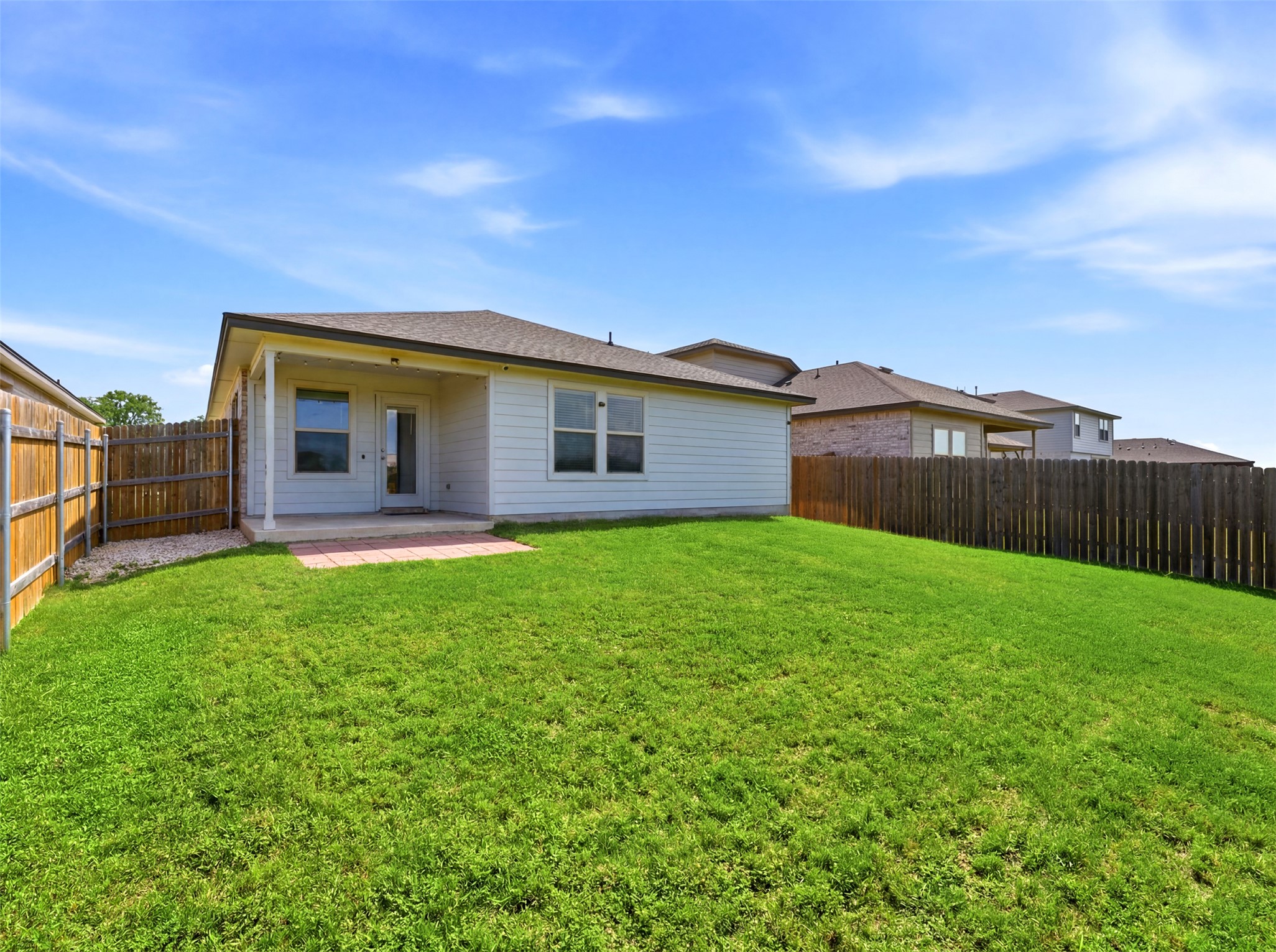 1024 Tipton Street Georgetown, TX 78633 - Photo 29 of 32 A neatly maintained lawn provides ample outdoor living space, perfect for recreation.