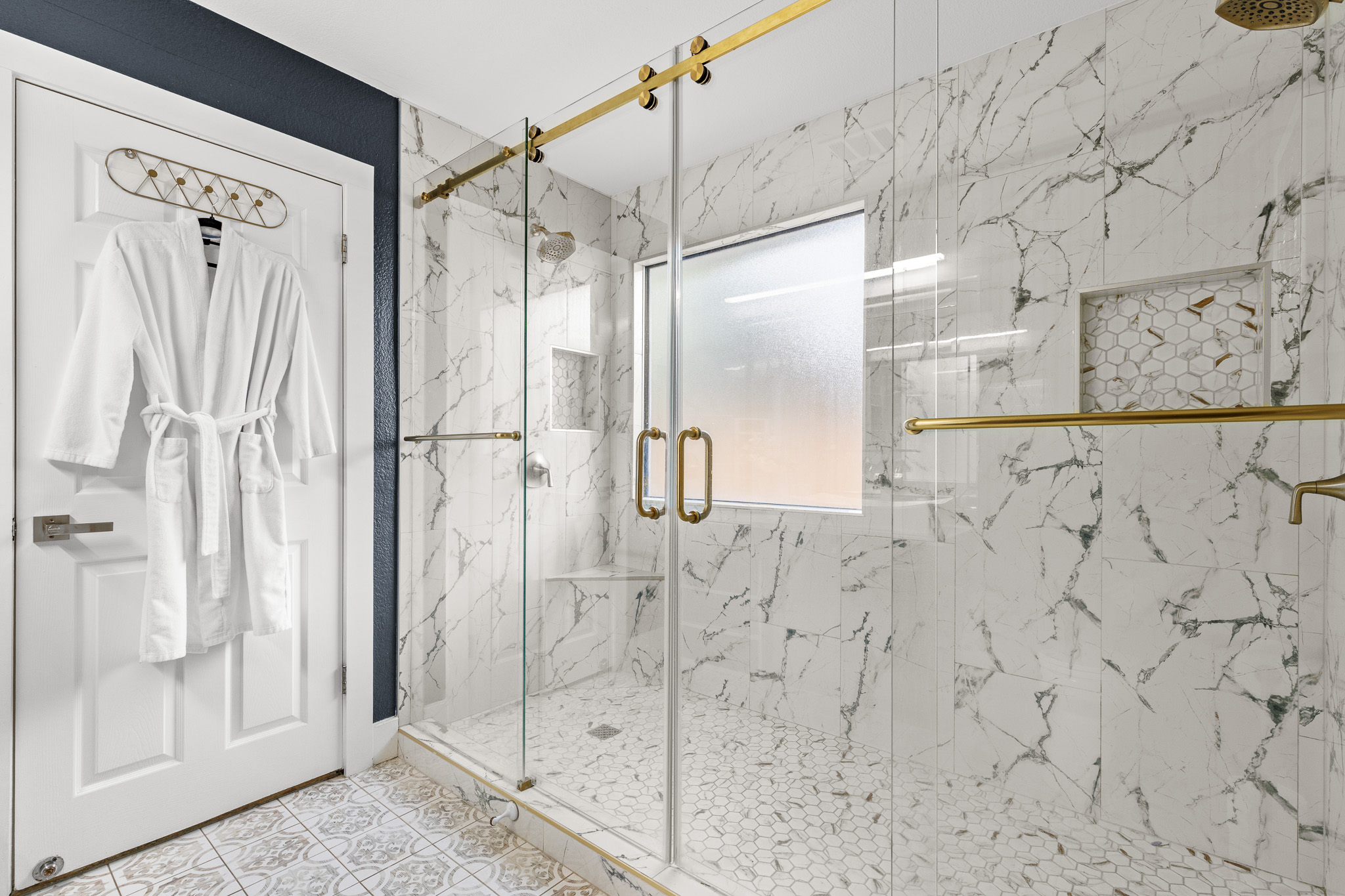 615 Barbara Way Bastrop, TX 78602 - Photo 14 of 27 a bathroom with a shower and a glass door