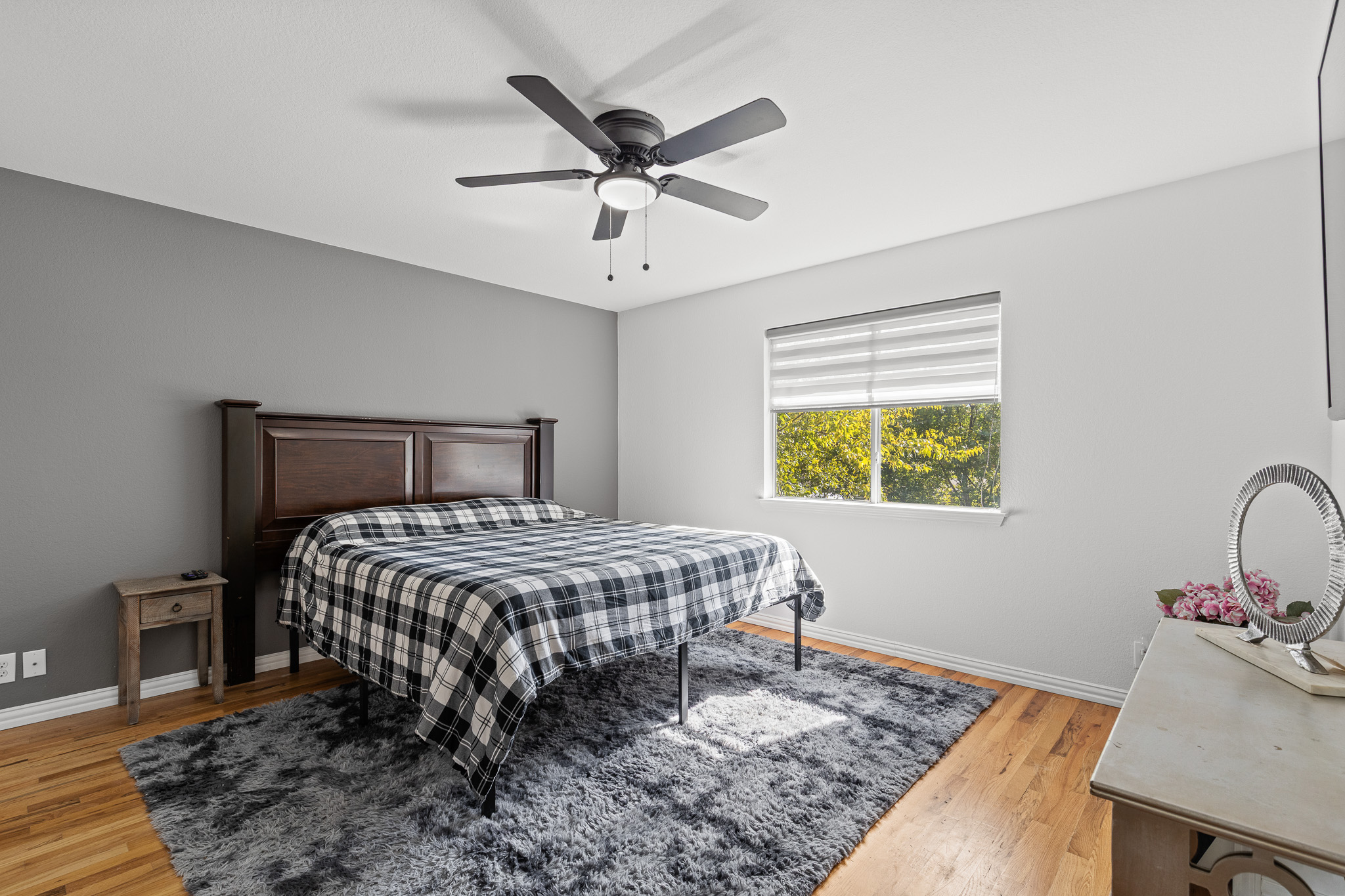 615 Barbara Way Bastrop, TX 78602 - Photo 19 of 27 a bedroom with a bed and a table in it