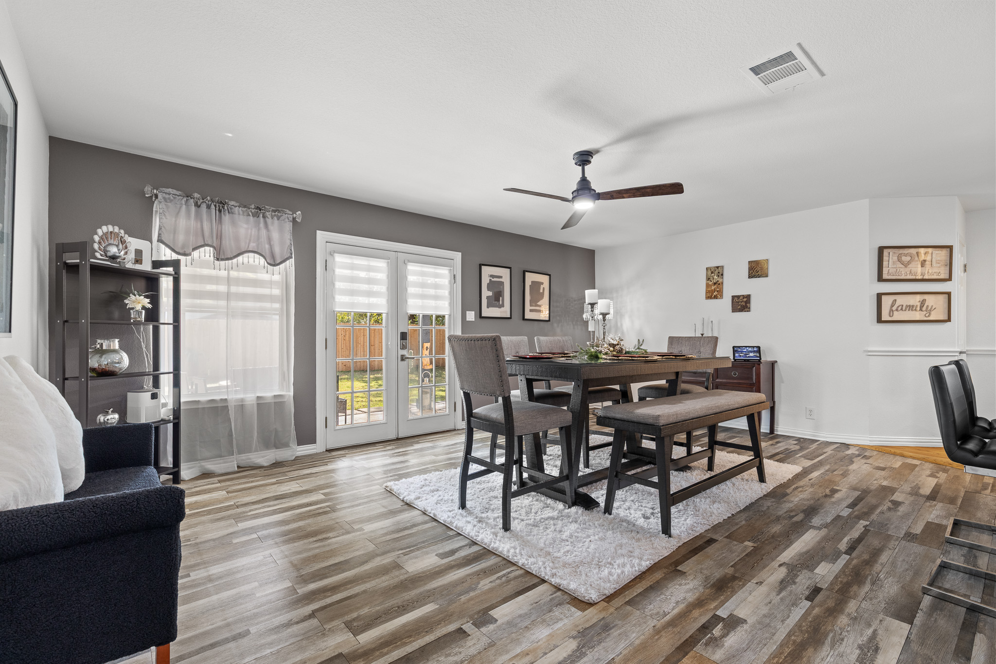 615 Barbara Way Bastrop, TX 78602 - Photo 10 of 27 a view of a dining room with furniture and wooden floor