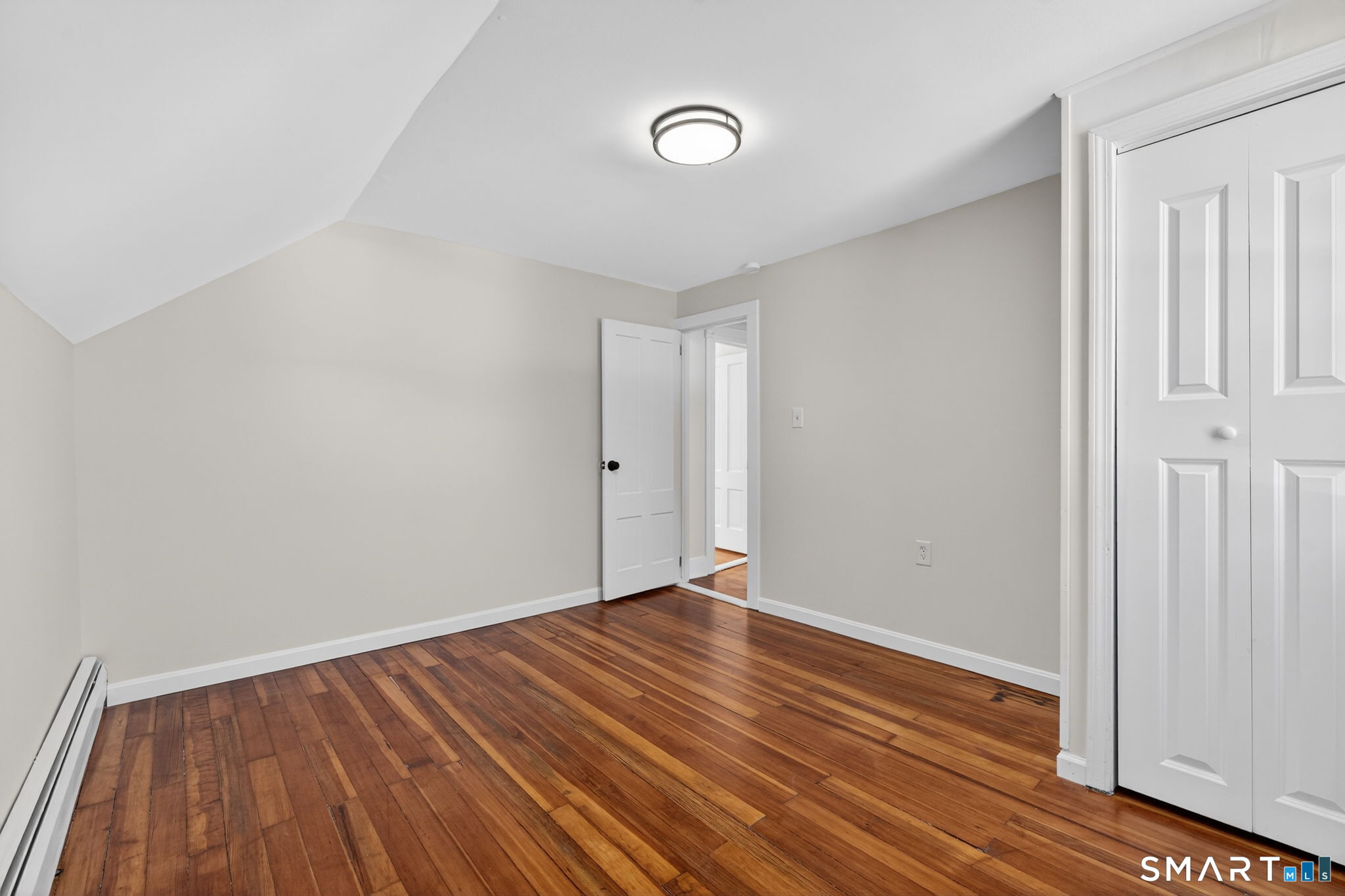 119 Taftville-Occum Road Norwich, CT 06360 - Photo 21 of 27 a view of room with wooden floor