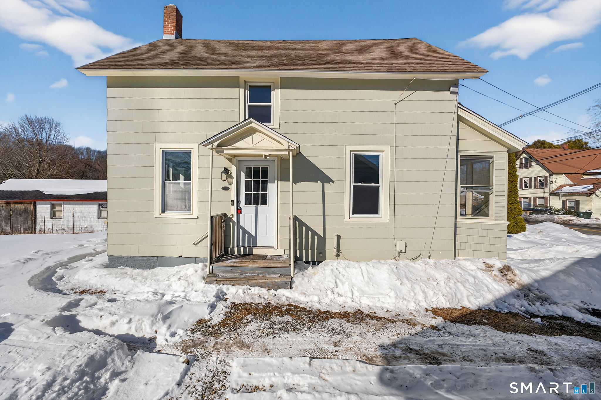 119 Taftville-Occum Road Norwich, CT 06360 - Photo 23 of 27 a front view of a house with a yard