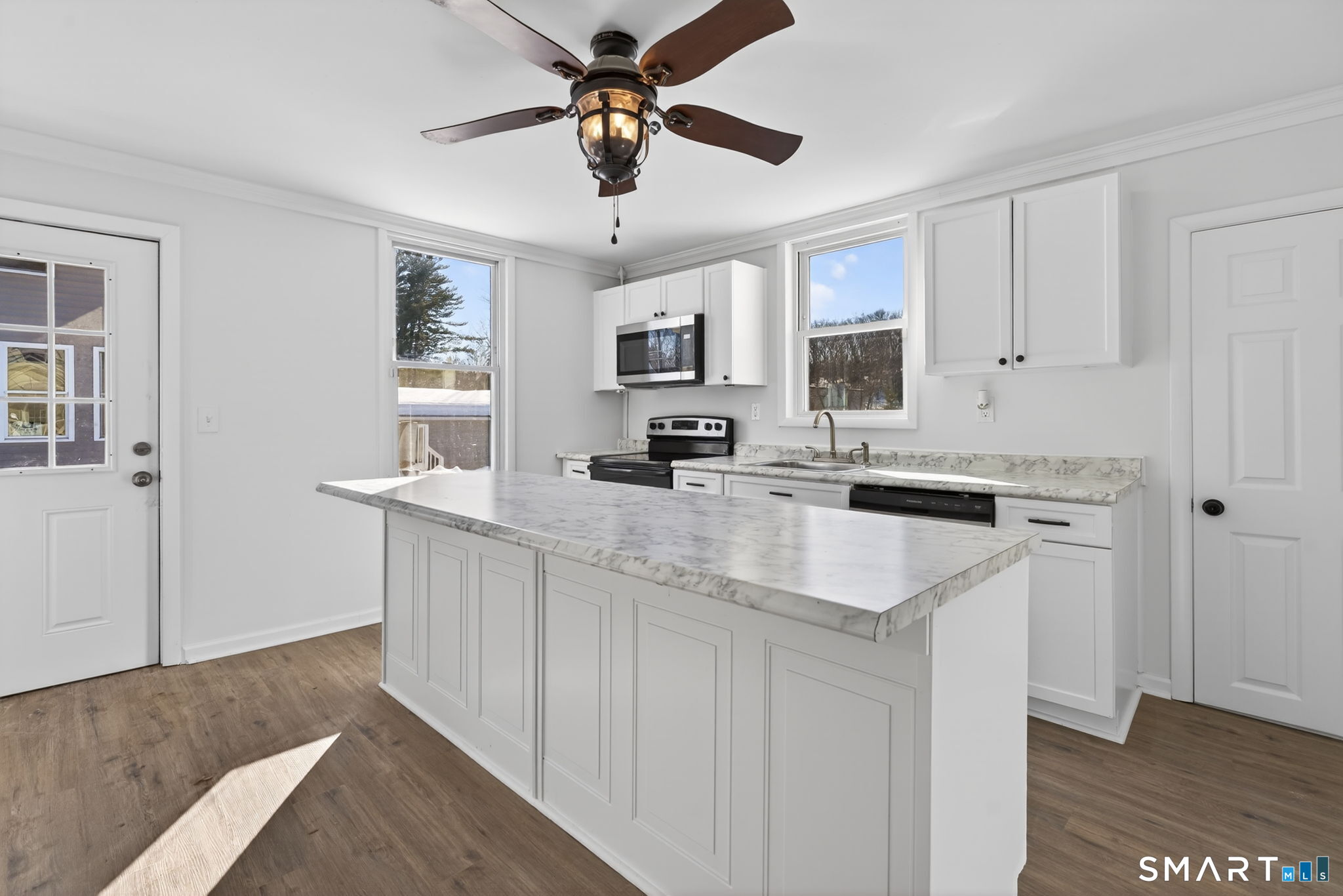 119 Taftville-Occum Road Norwich, CT 06360 - Photo 5 of 27 a kitchen with stainless steel appliances granite countertop a sink and cabinets