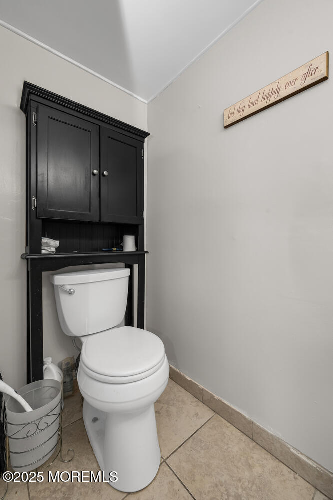 3 Lisa Drive Hazlet, NJ 07730 - Photo 16 of 30 a bathroom with a toilet and a vanity
