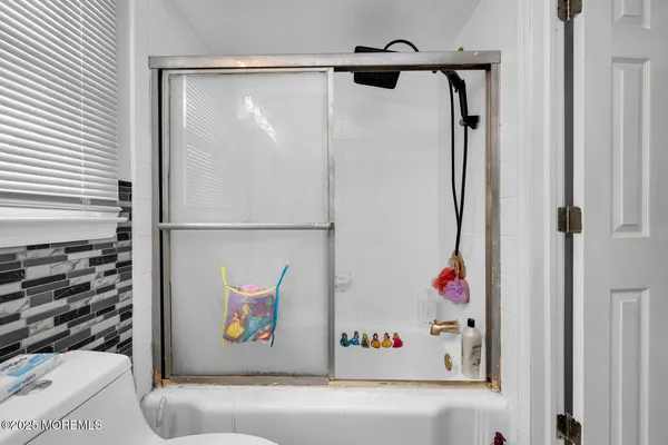 a close view of a refrigerator in a bathroom