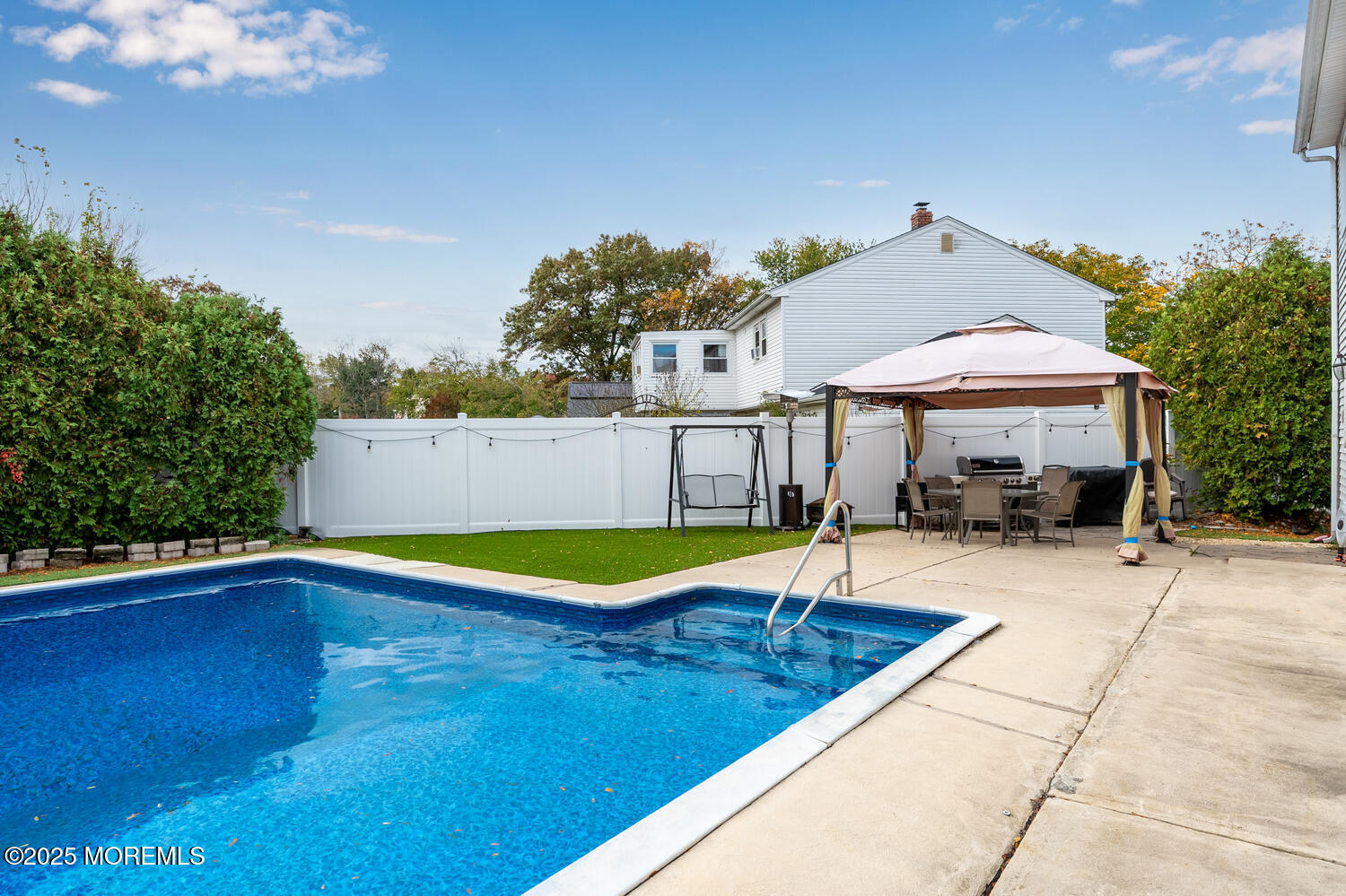 3 Lisa Drive Hazlet, NJ 07730 - Photo 29 of 30 a swimming pool with outdoor seating and yard