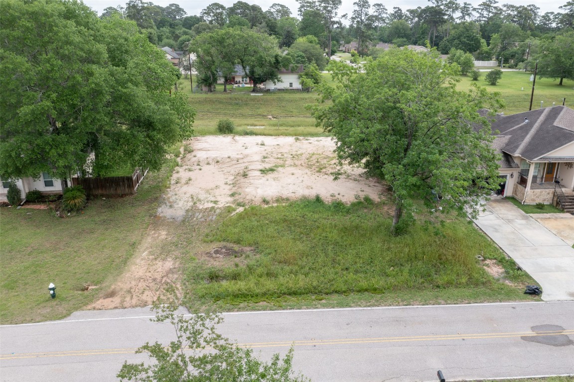 626 Ames Street Spring, TX 77373 - Photo 7 of 18 an aerial view of a house with a yard and lake view
