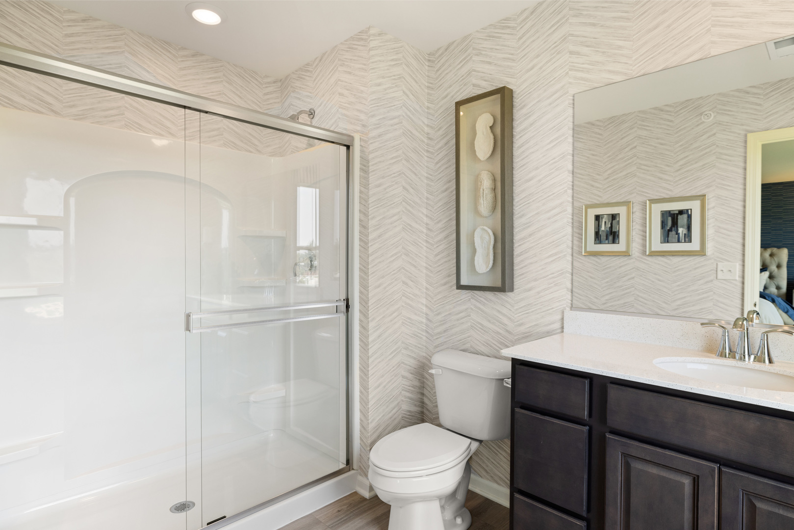 557 Wolverine Drive Aurora, IL 60502 - Photo 20 of 30 a bathroom with a sink a toilet and shower