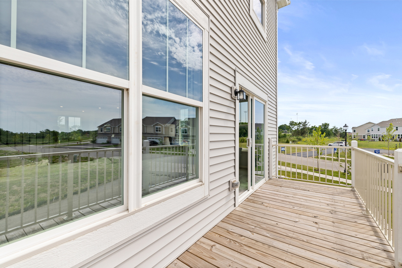 557 Wolverine Drive Aurora, IL 60502 - Photo 28 of 30 a balcony with view of city from a balcony