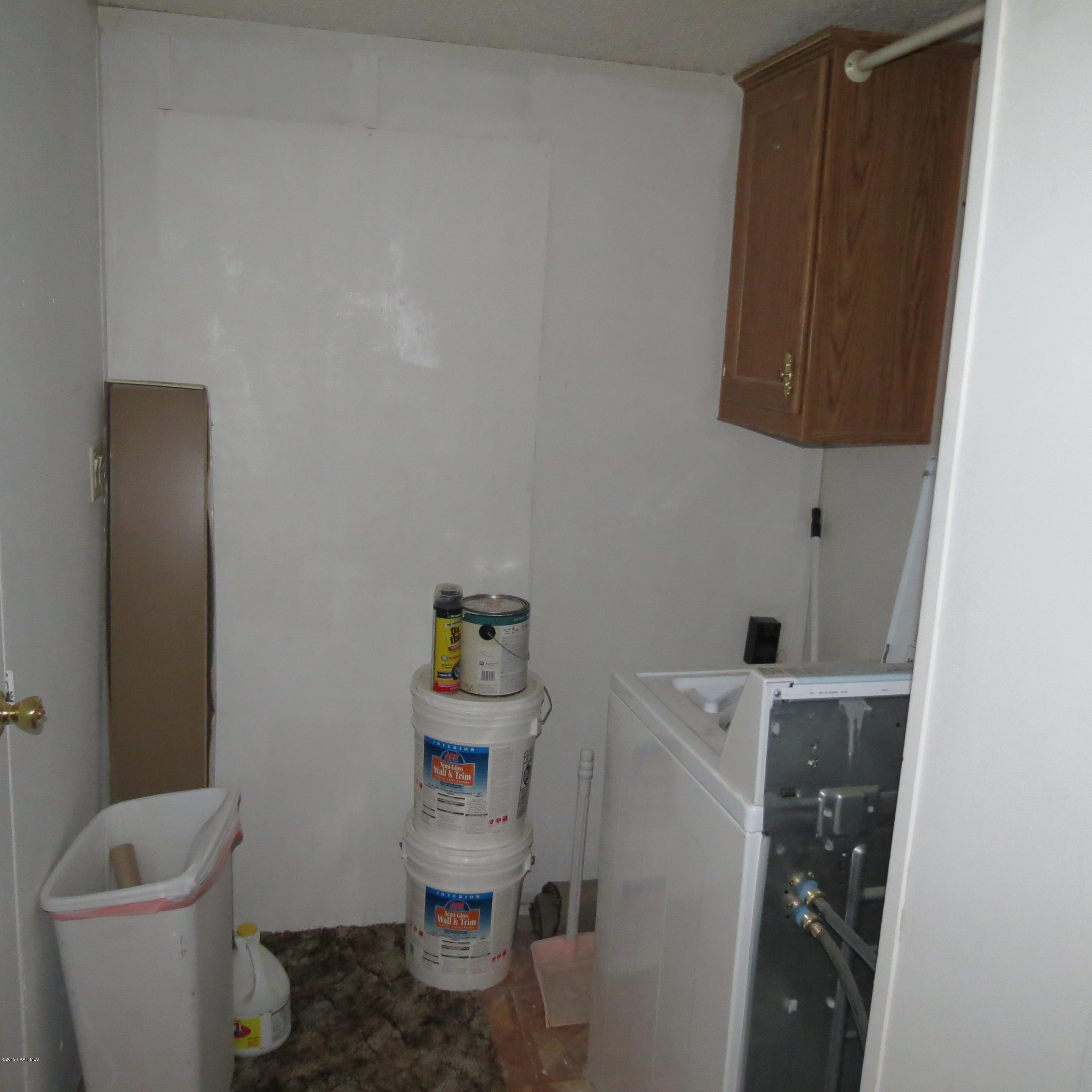 1400 Saddle Road Paulden, AZ 86334 - Photo 14 of 28 a bathroom with a toilet and a sink