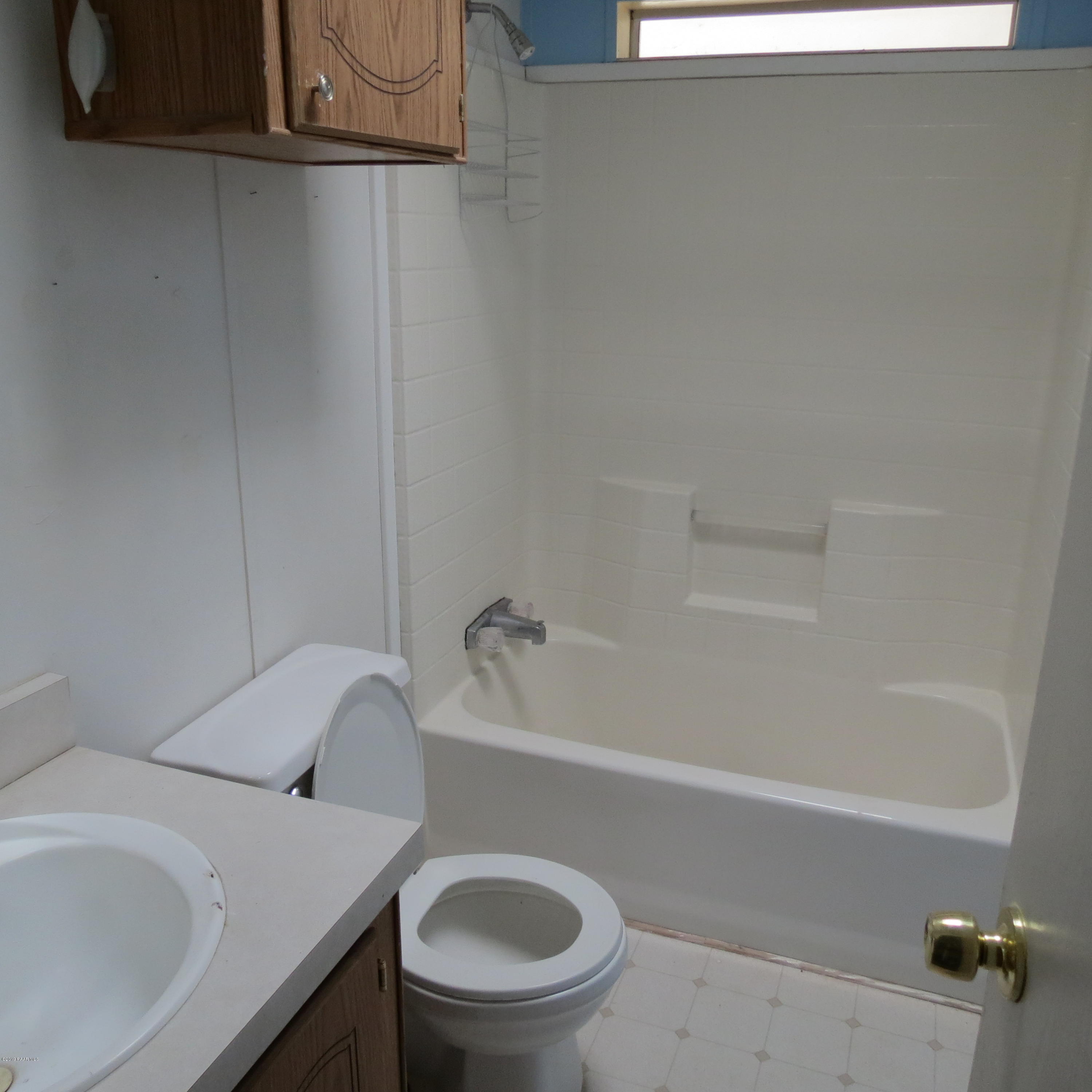 1400 Saddle Road Paulden, AZ 86334 - Photo 16 of 28 a bathroom with a sink and toilet