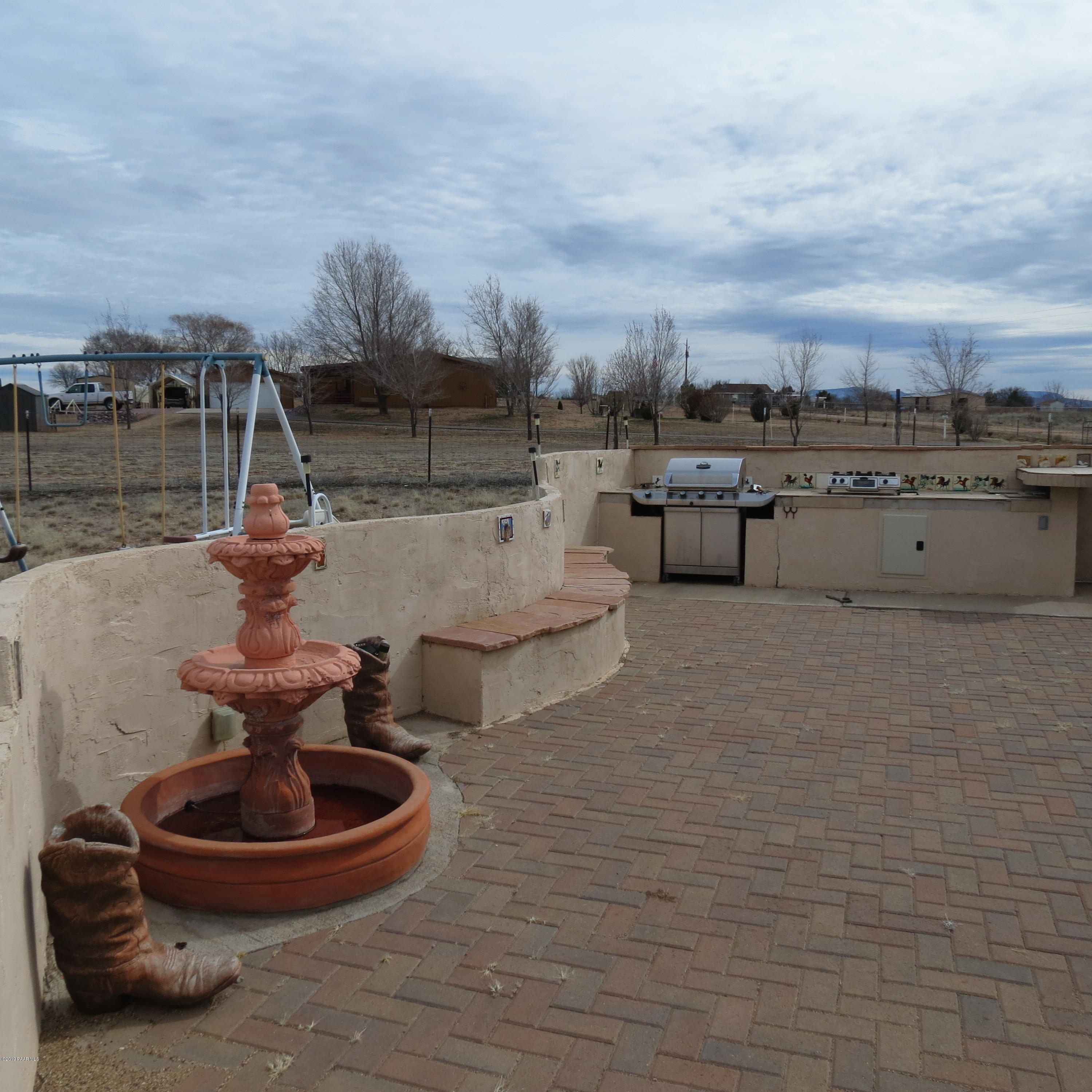 1400 Saddle Road Paulden, AZ 86334 - Photo 18 of 28 a view of a swimming pool with a chairs