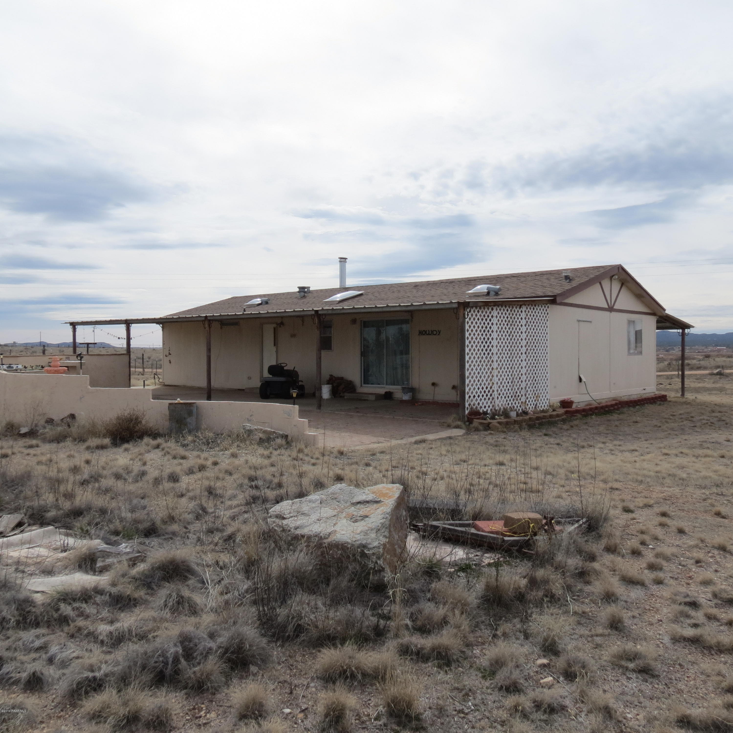 1400 Saddle Road Paulden, AZ 86334 - Photo 21 of 28 a view of a house with backyard