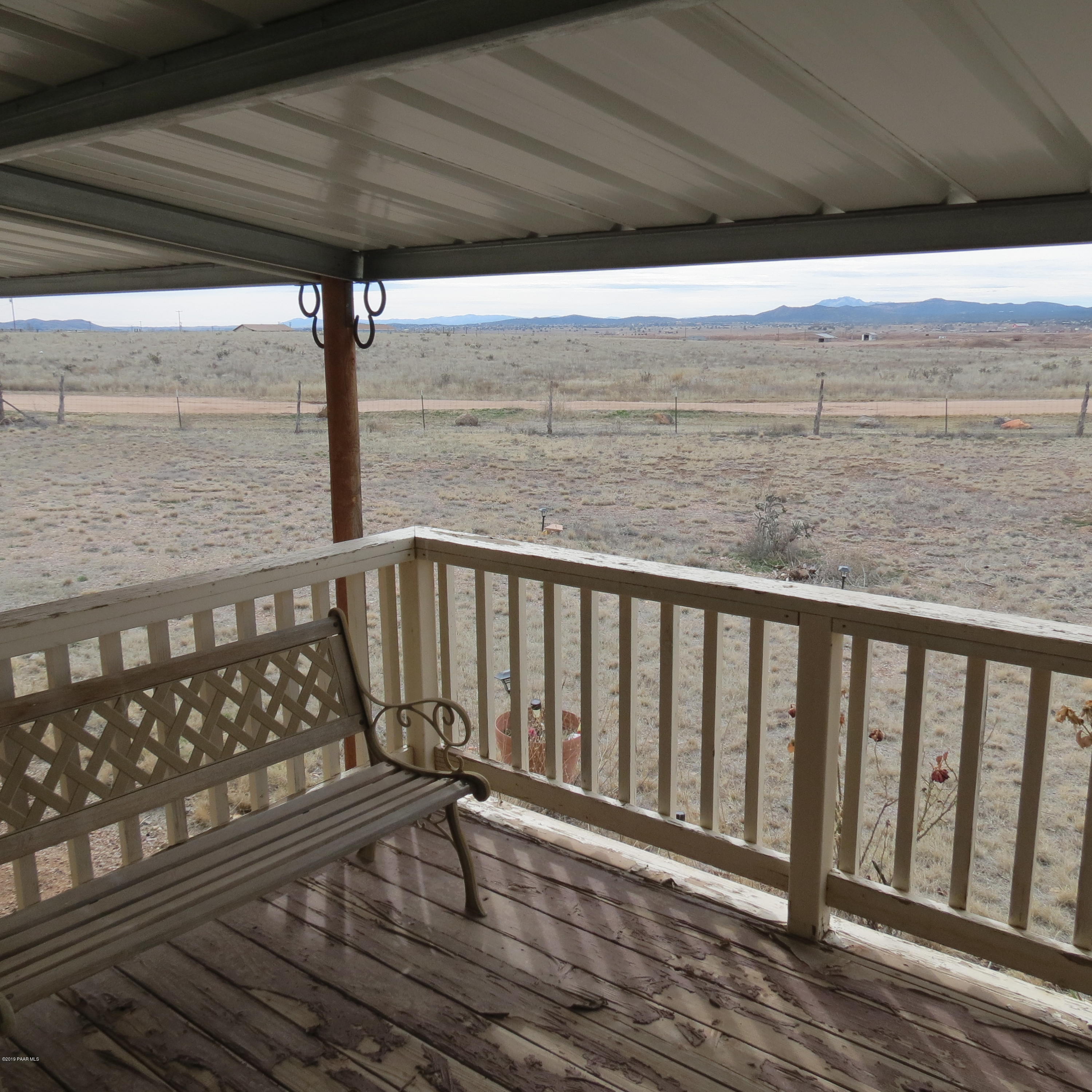 1400 Saddle Road Paulden, AZ 86334 - Photo 6 of 28 a view of a balcony with wooden floor
