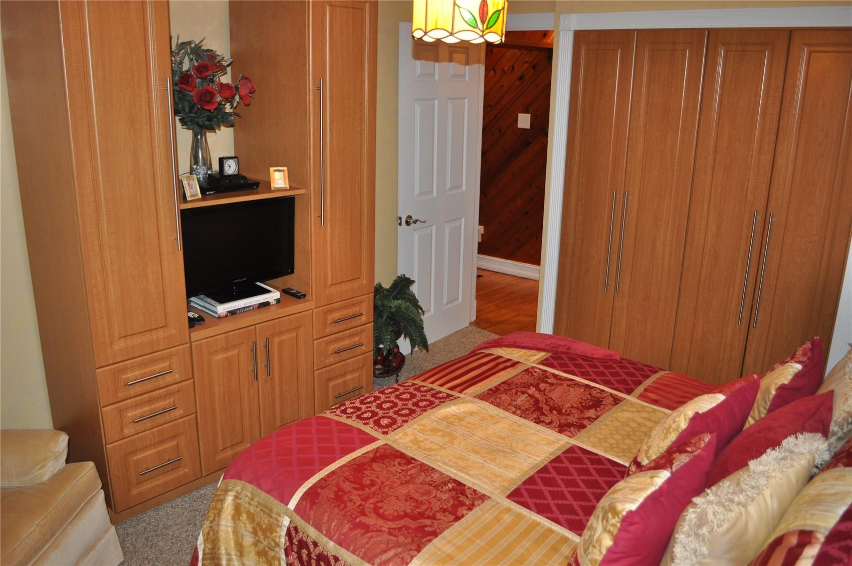 2175 Northeast 185th Street Miami, FL 33180 - Photo 7 of 32 Bedroom 3. Custom cabinets and closets.