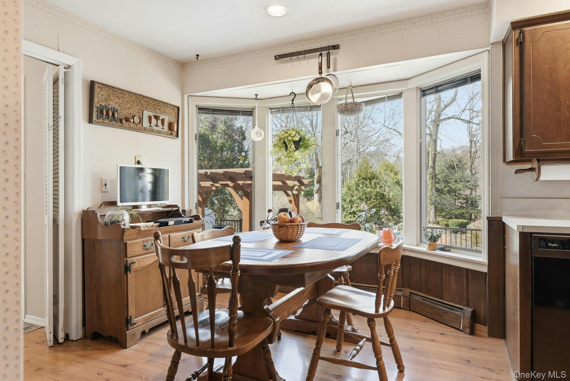 35 East Neck Road Huntington, NY 11743 - Photo 14 of 41 a view of a dining room with furniture window and outside view