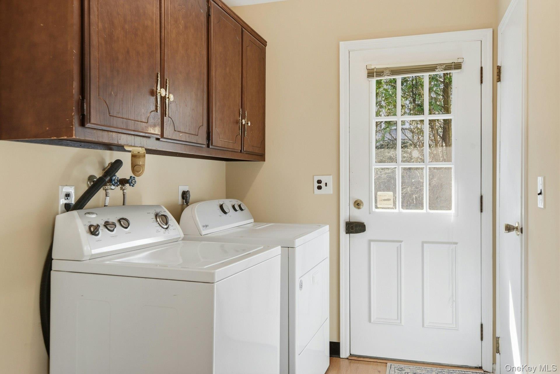 35 East Neck Road Huntington, NY 11743 - Photo 17 of 41 a utility room with dryer and washer