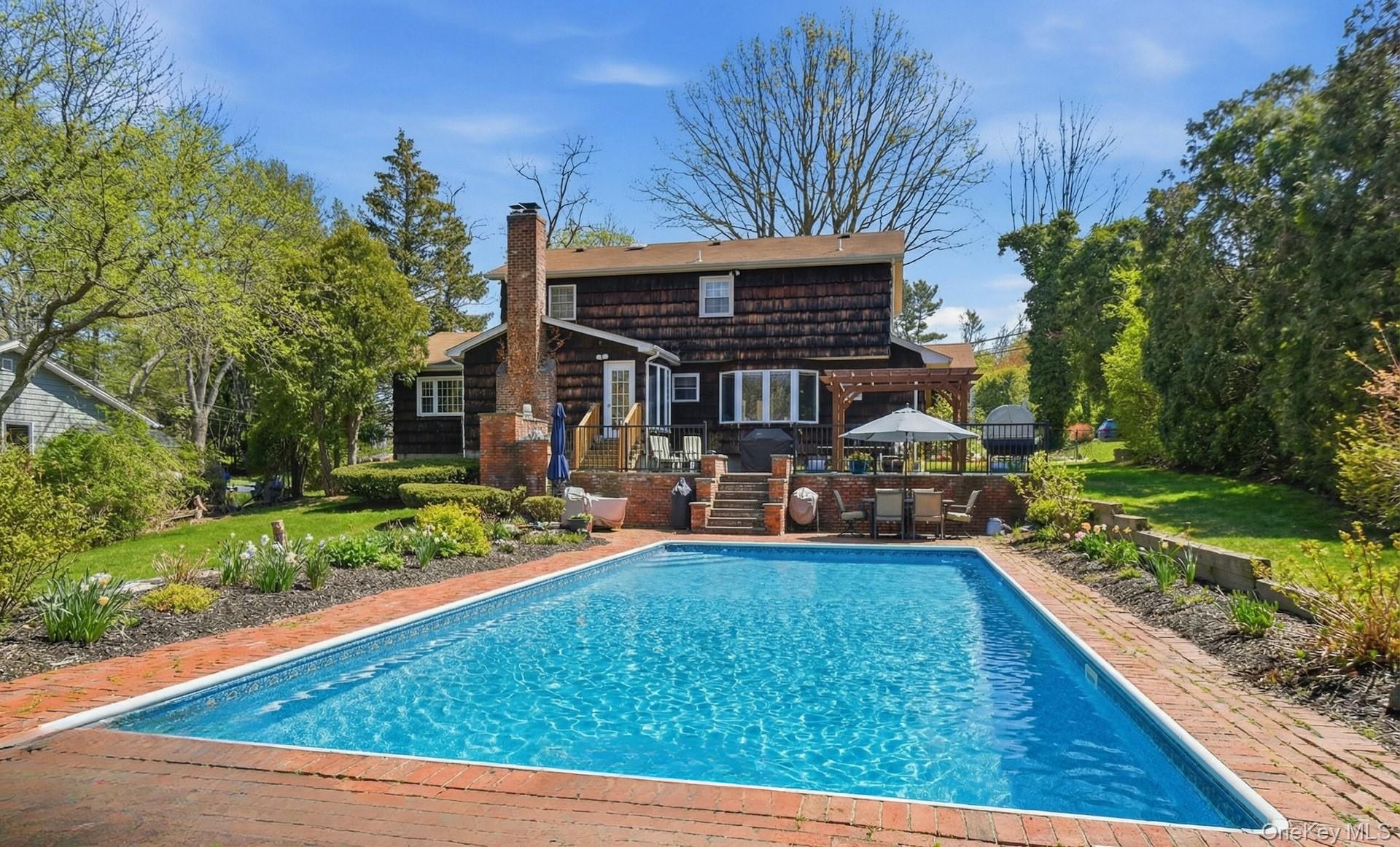 35 East Neck Road Huntington, NY 11743 - Photo 30 of 41 a view of a house with yard and porch