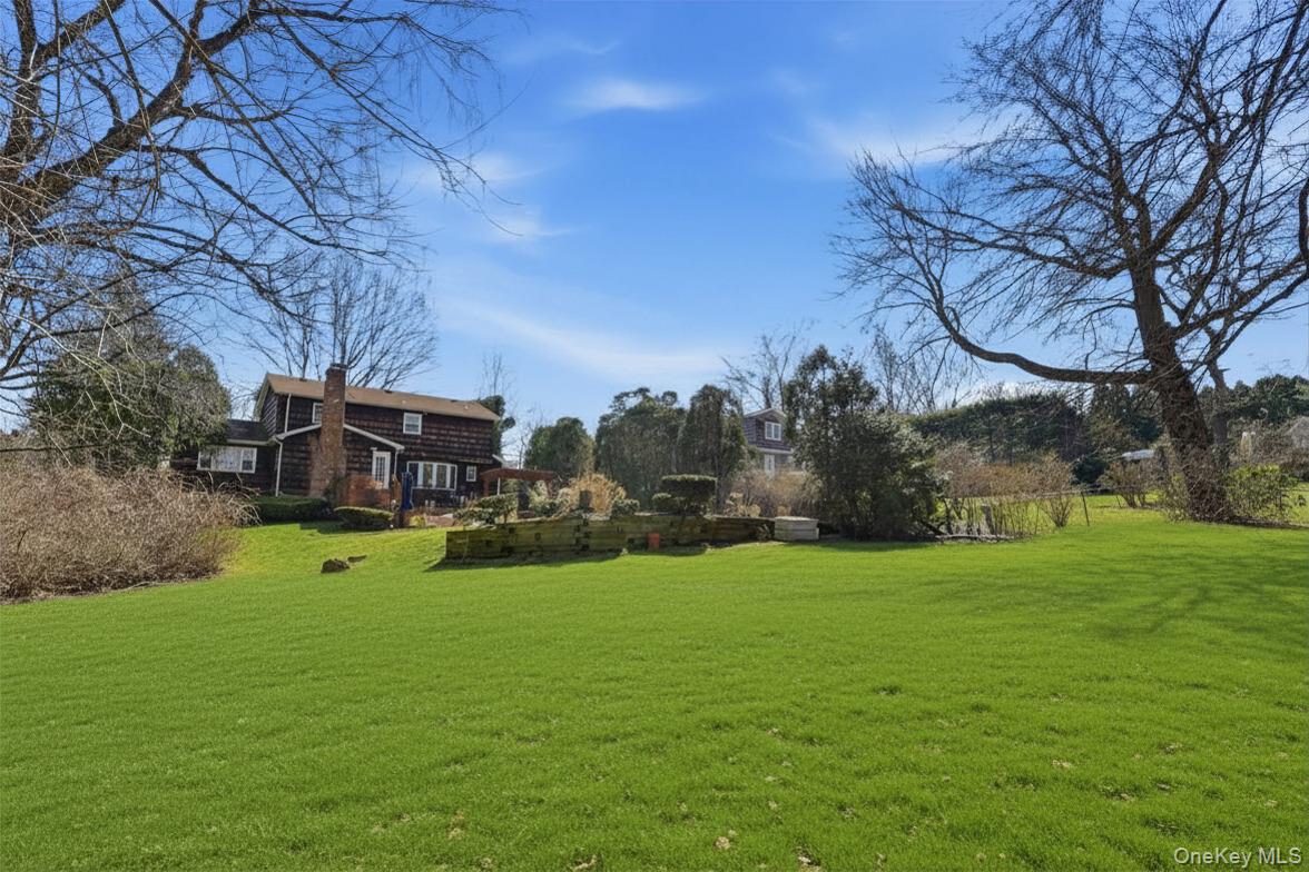 35 East Neck Road Huntington, NY 11743 - Photo 33 of 41 a view of a house with a big yard
