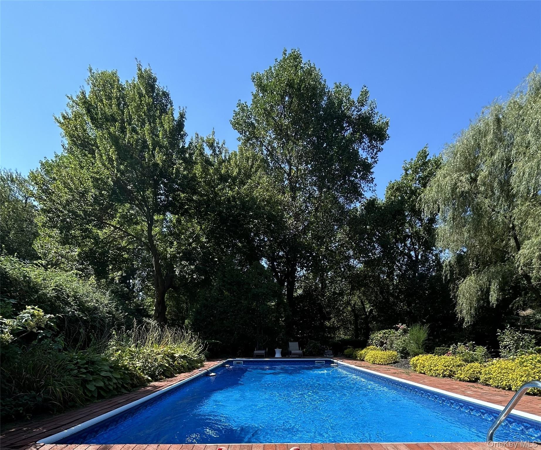 35 East Neck Road Huntington, NY 11743 - Photo 4 of 41 a view of an outdoor space