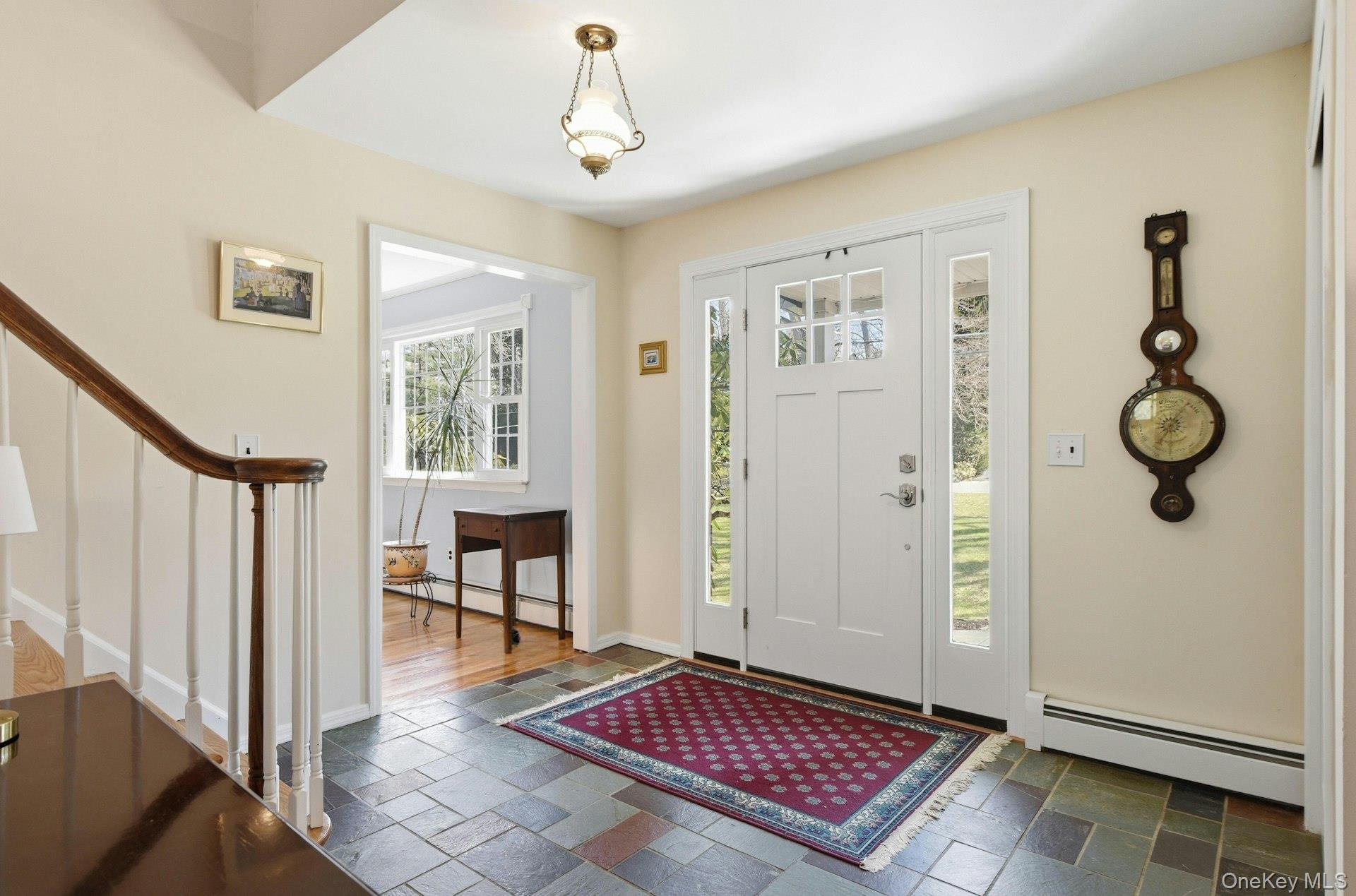 35 East Neck Road Huntington, NY 11743 - Photo 5 of 41 a view of an entryway with wooden floor