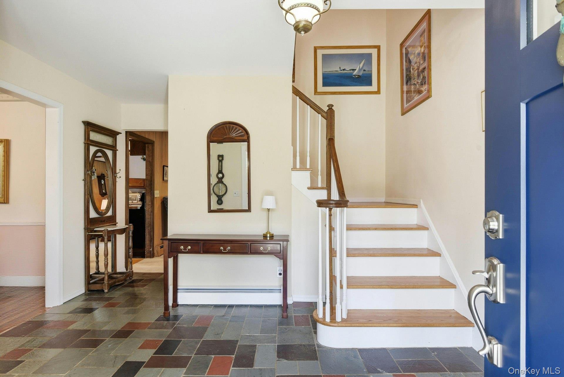 35 East Neck Road Huntington, NY 11743 - Photo 6 of 41 a view of front door with stairs