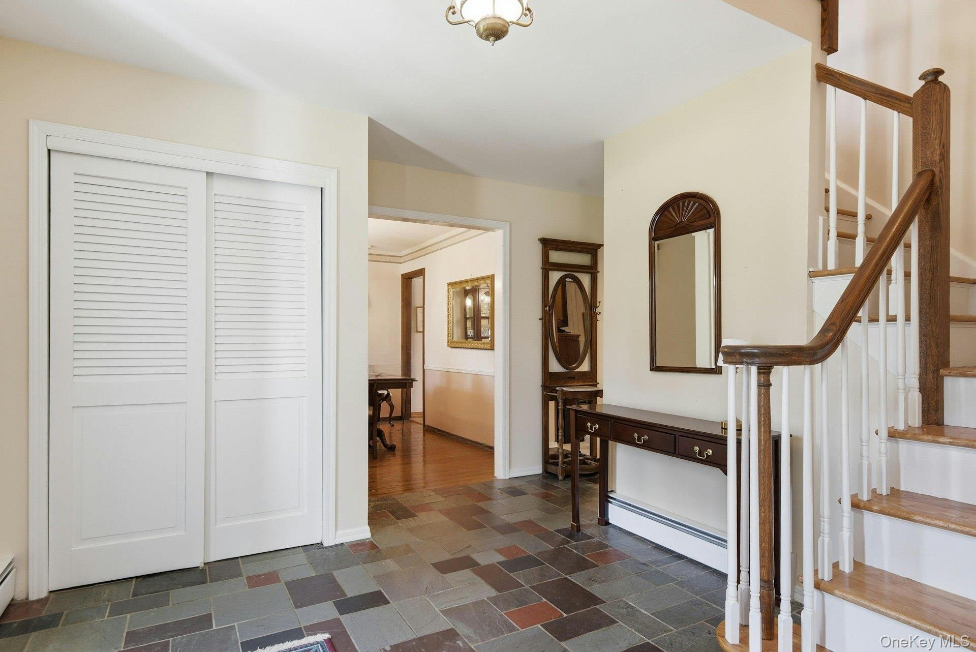 35 East Neck Road Huntington, NY 11743 - Photo 7 of 41 a view of entryway and hall with wooden floor