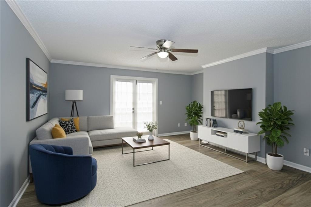 122 Rue Fontaine Lithonia, GA 30038 - Photo 2 of 36 a living room with furniture potted plant and a window