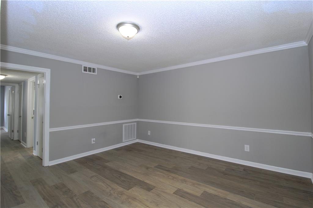 122 Rue Fontaine Lithonia, GA 30038 - Photo 6 of 36 a view of an empty room
