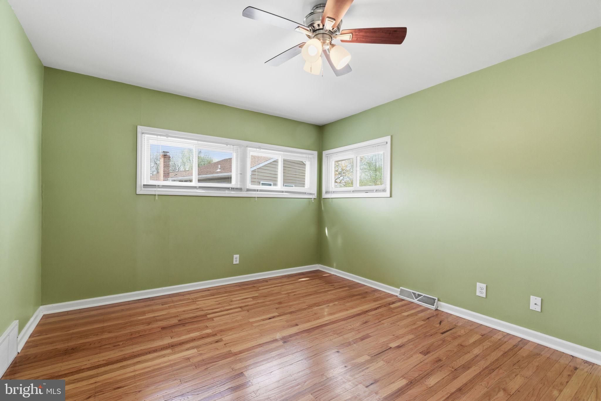 502 Stevens Road Morrisville, PA 19067 - Photo 25 of 37 a view of a room with wooden floor and fan