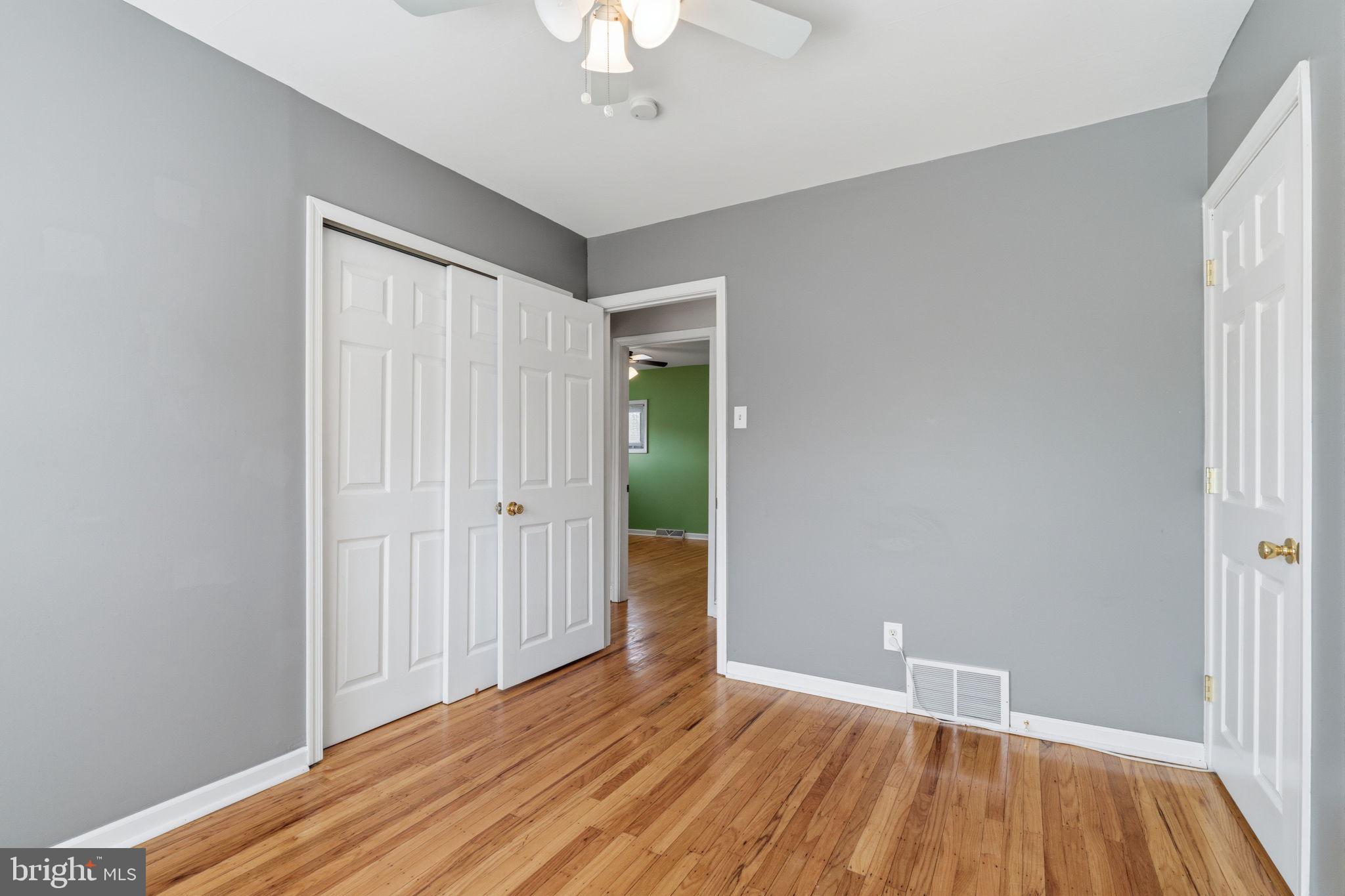 502 Stevens Road Morrisville, PA 19067 - Photo 30 of 37 a view of an empty room with wooden floor