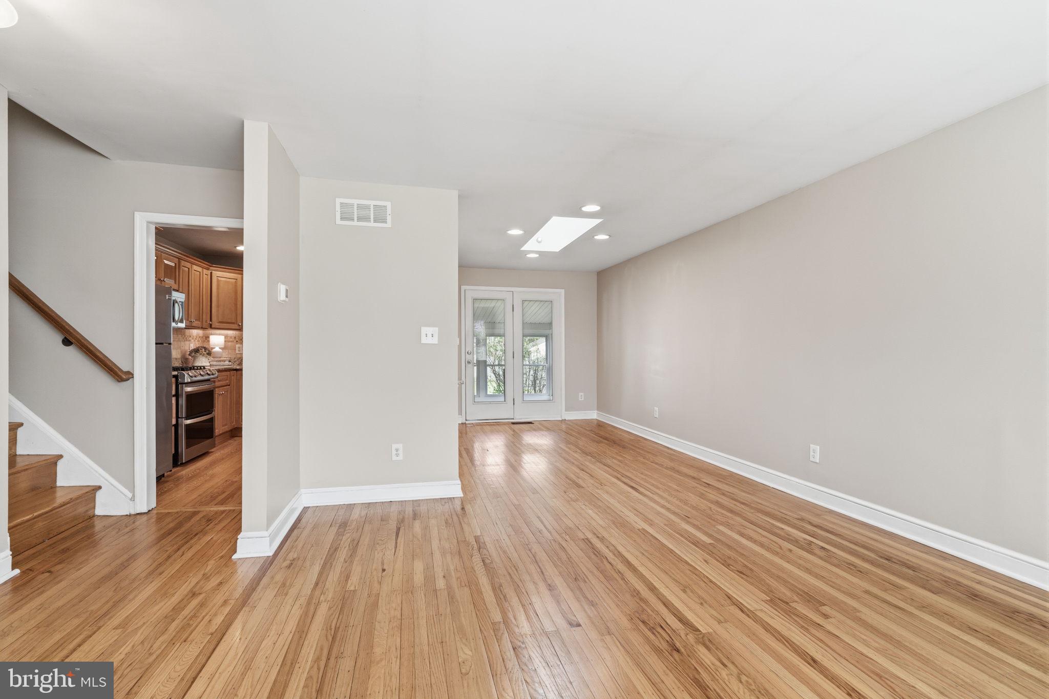 502 Stevens Road Morrisville, PA 19067 - Photo 6 of 37 wooden floor in an empty room with a window