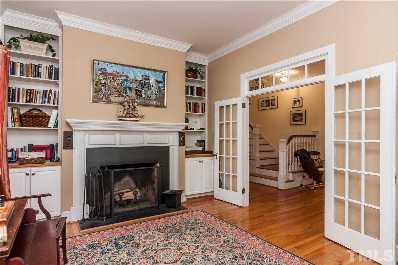 2501 York Road Raleigh, NC 27608 - Photo 5 of 25 Another view of the study, showing the French doors and masonry wood-burning fireplace