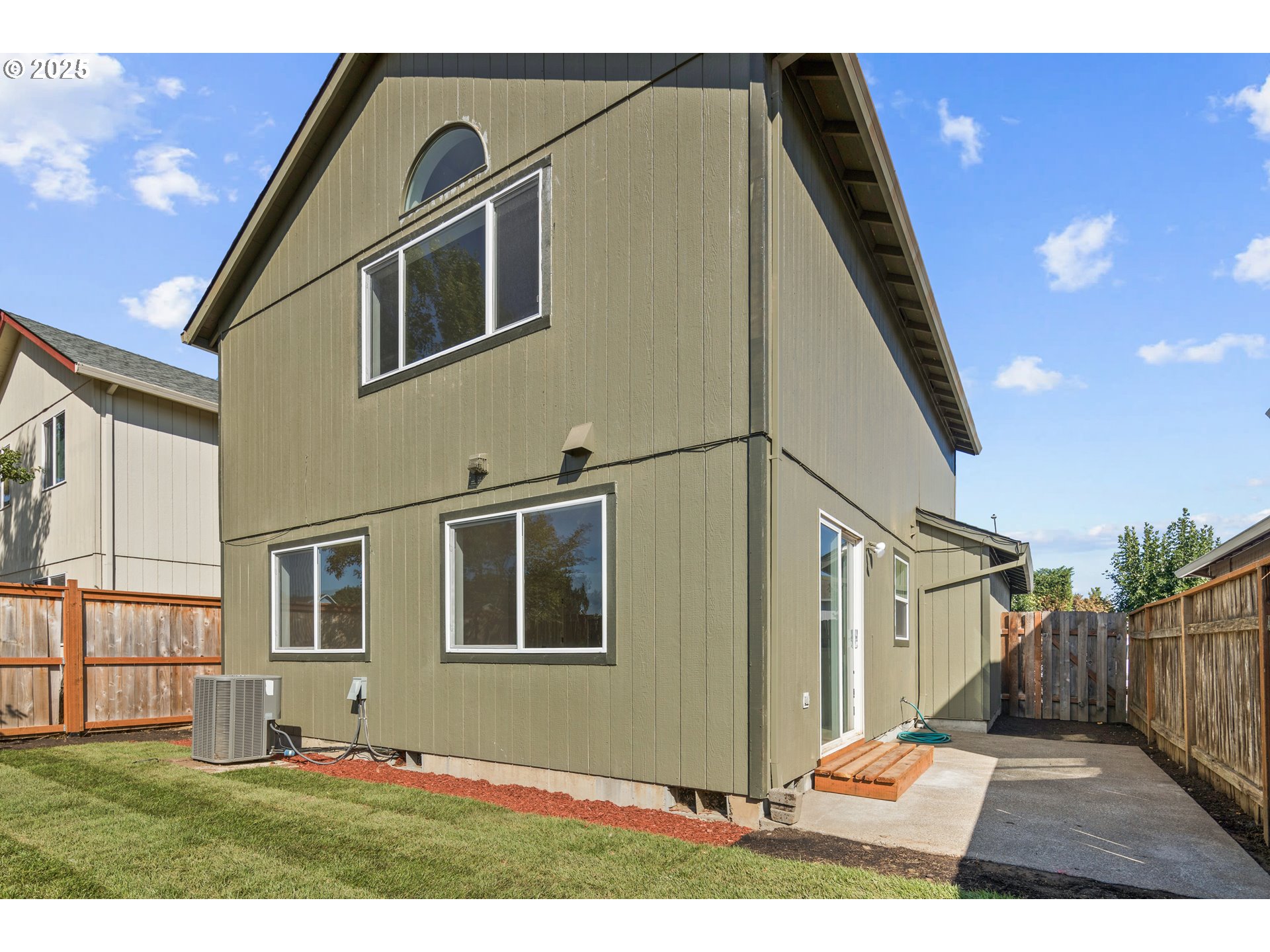169 South 25th Avenue Cornelius, OR 97113 - Photo 26 of 27 a backyard of a house with lots of green space and outdoor seating