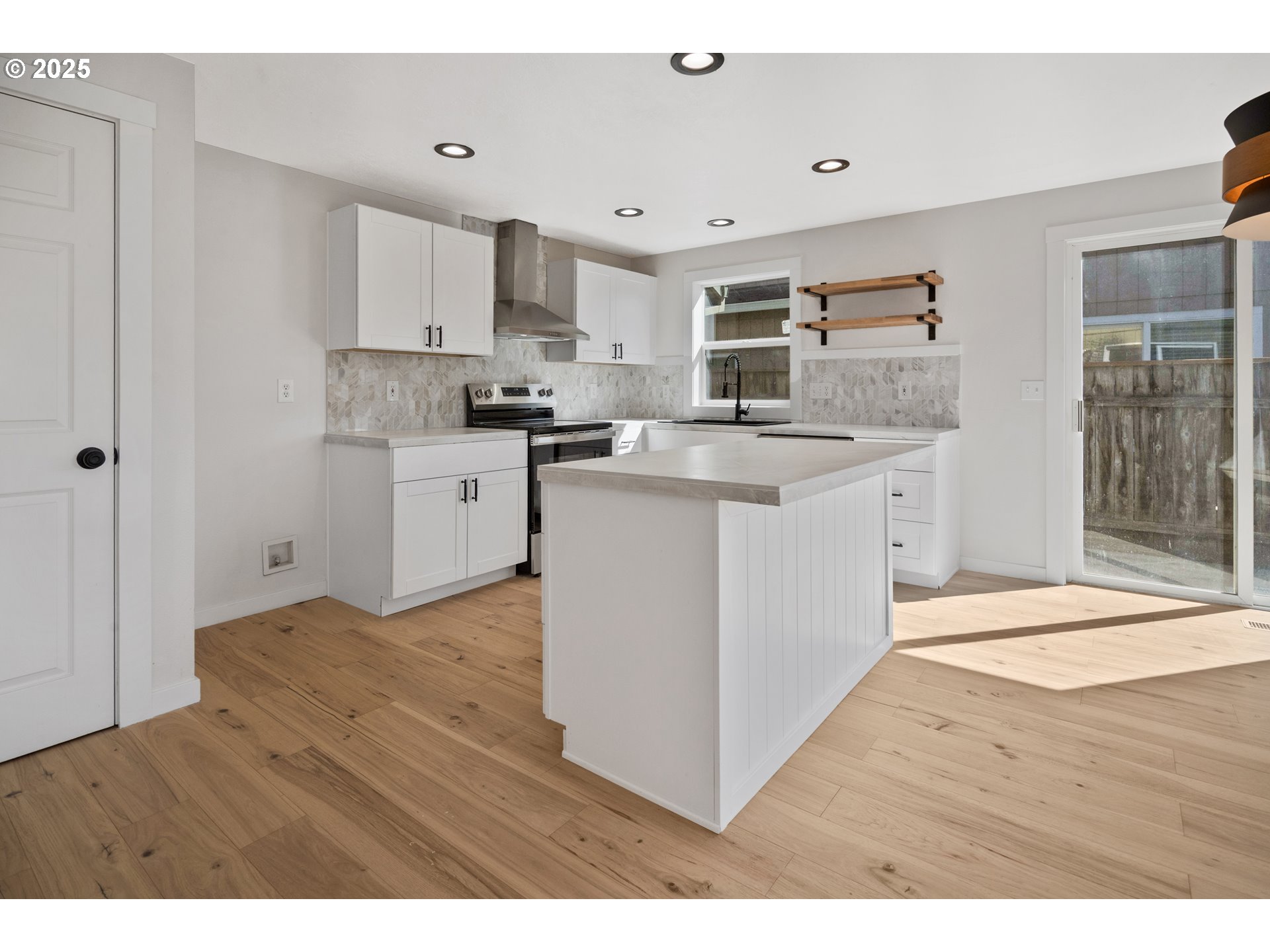 169 South 25th Avenue Cornelius, OR 97113 - Photo 10 of 27 a kitchen with stainless steel appliances granite countertop a stove top oven a sink dishwasher and a refrigerator