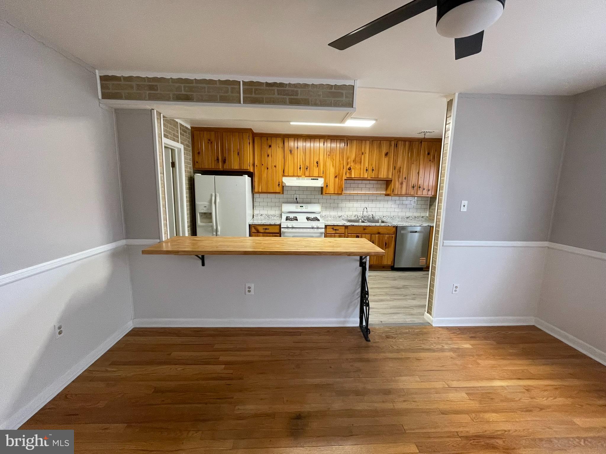 8134 Gray Haven Road Baltimore, MD 21222 - Photo 20 of 30 a view of kitchen with wooden floor