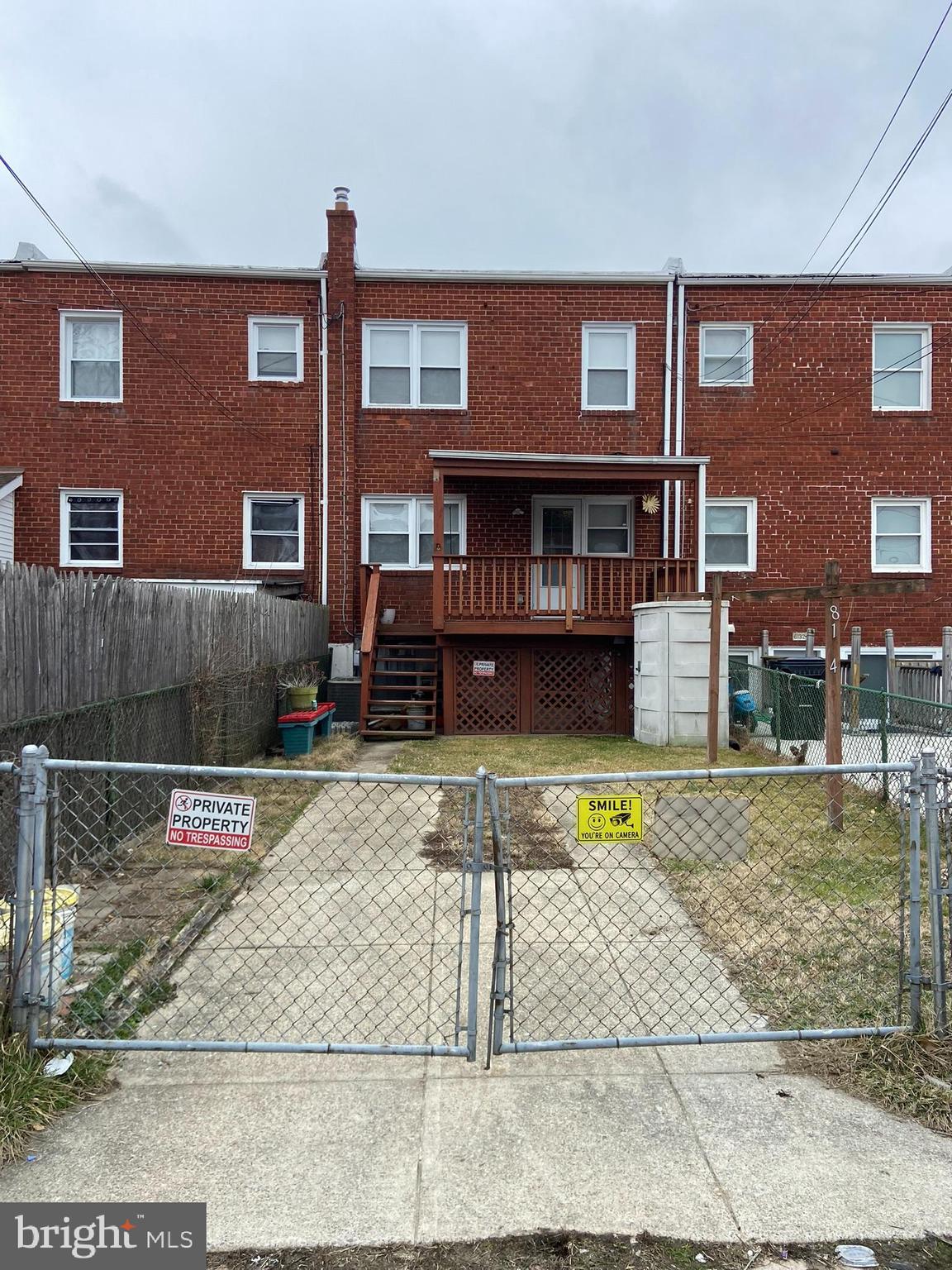 8134 Gray Haven Road Baltimore, MD 21222 - Photo 2 of 30 a front view of a house with garden