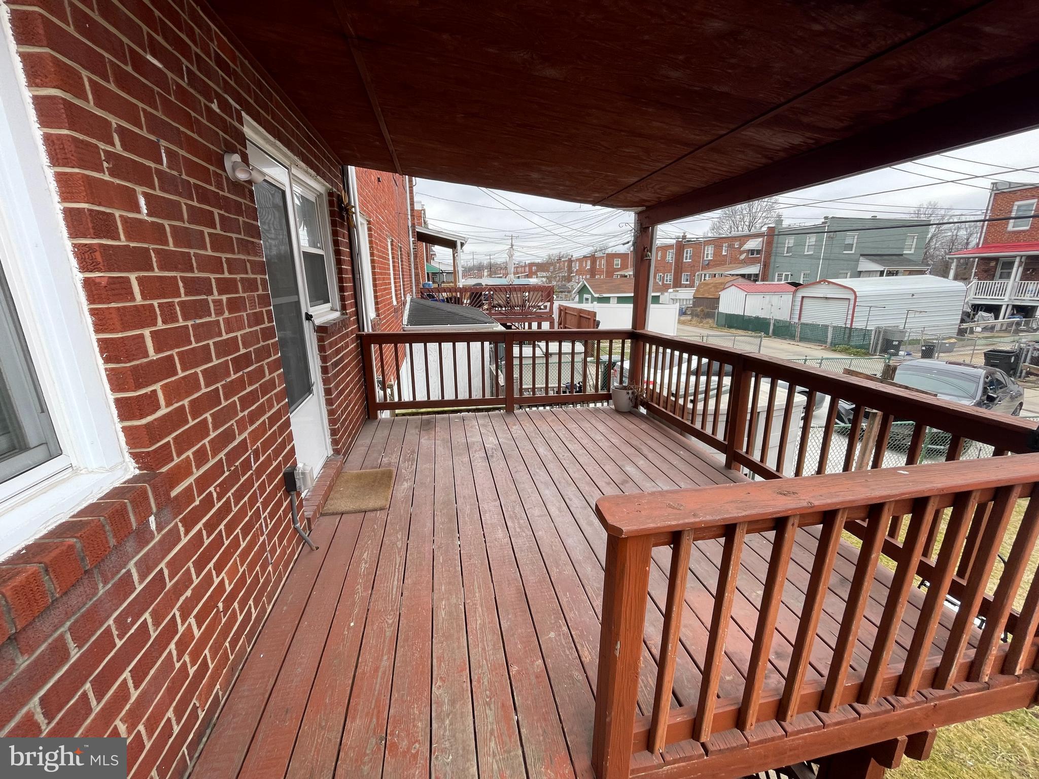 8134 Gray Haven Road Baltimore, MD 21222 - Photo 30 of 30 a view of a balcony with wooden floor