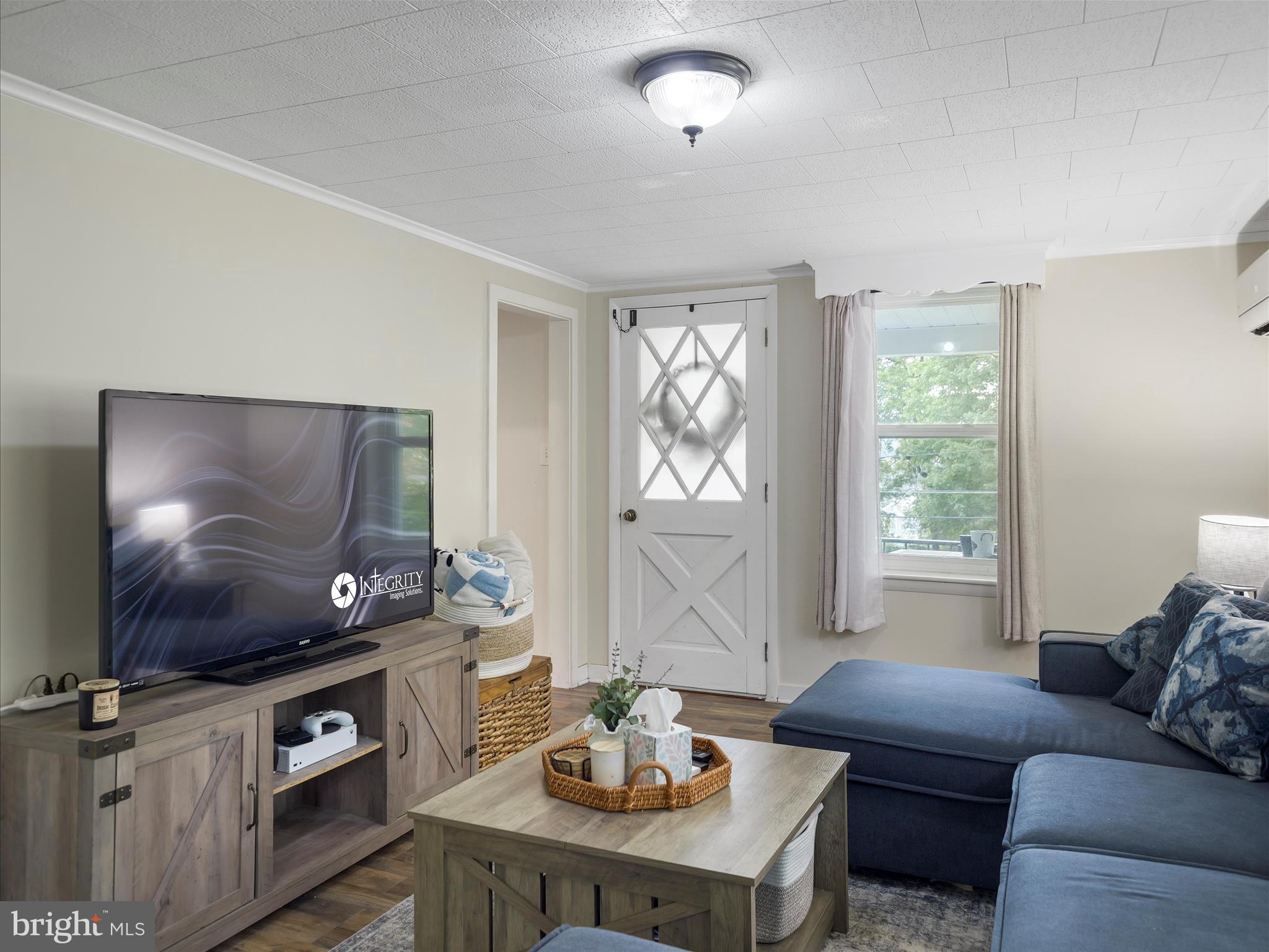 2550 Iron Springs Road Fairfield, PA 17320 - Photo 17 of 32 a living room with furniture and a flat screen tv