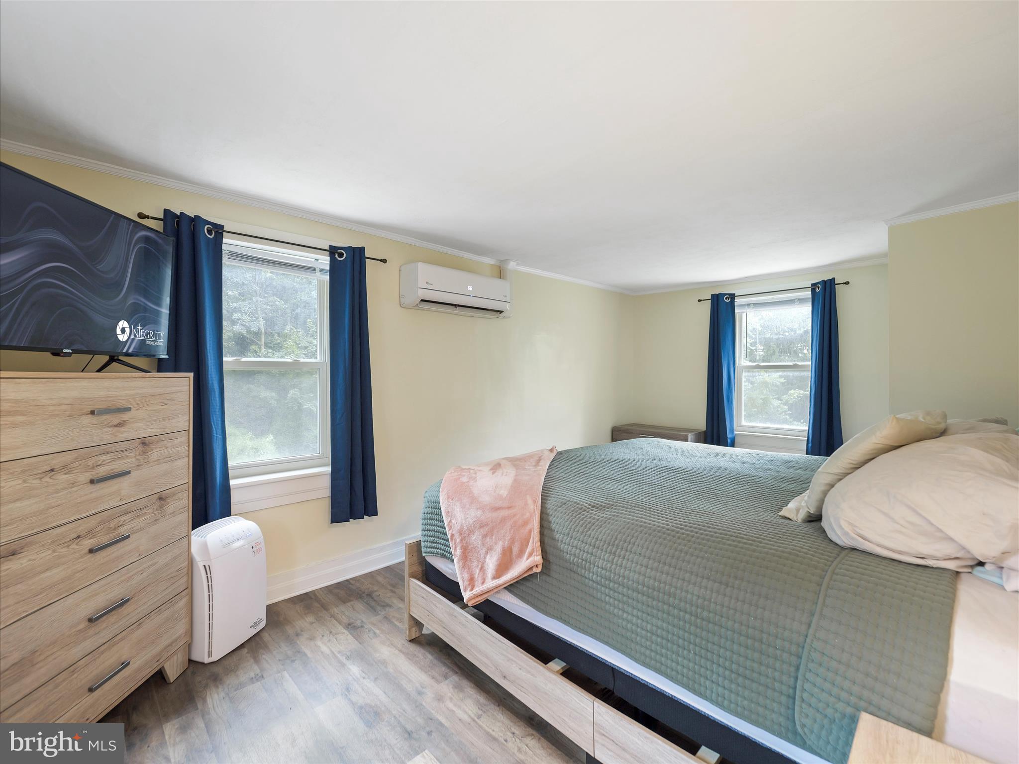 2550 Iron Springs Road Fairfield, PA 17320 - Photo 18 of 32 a bedroom with a bed and wooden floor