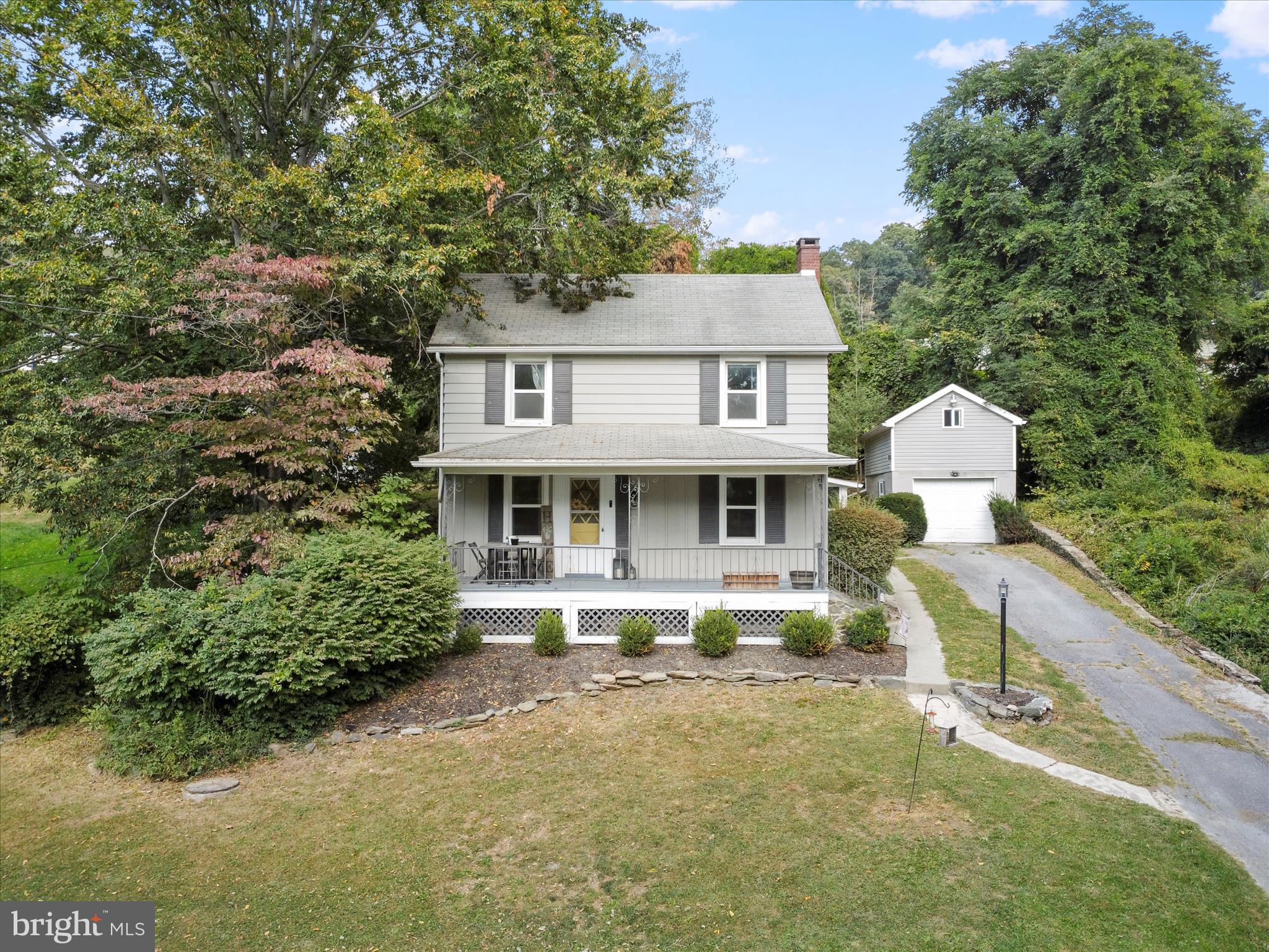 2550 Iron Springs Road Fairfield, PA 17320 - Photo 2 of 32 a front view of a house with garden