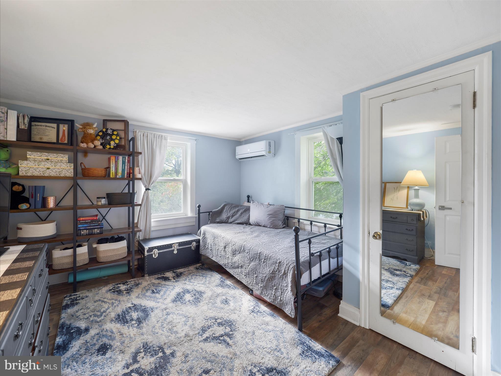 2550 Iron Springs Road Fairfield, PA 17320 - Photo 21 of 32 a bedroom with a bed and wooden floor