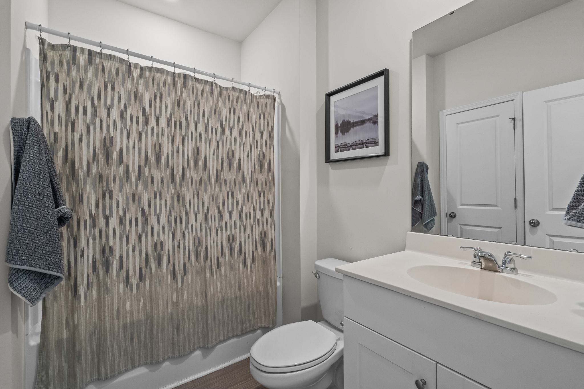 201 Craigflower Court Longs, SC 29568 - Photo 27 of 35 Full bathroom with vanity and a shower with curtain