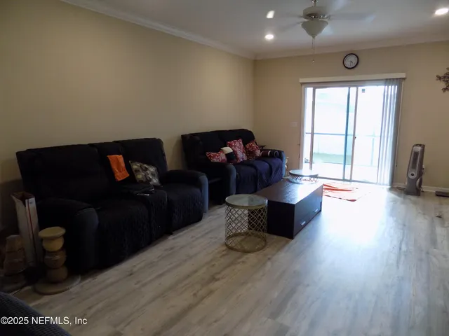 a bedroom with bed and window